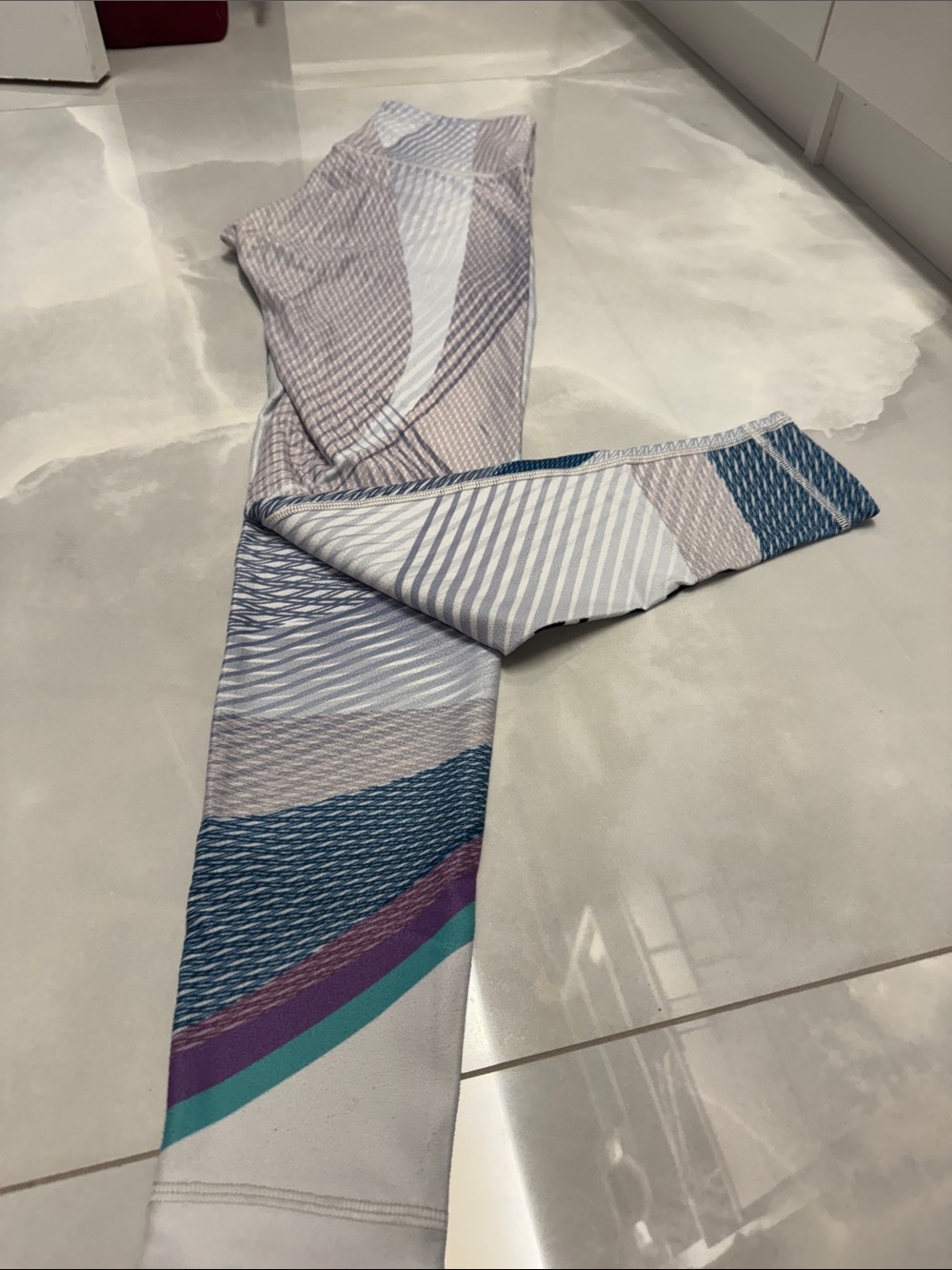 Peloton Leggings in Teal, Purple, Gray, and White
